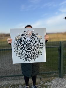 Different sizes of mandala design stencil displayed side by side