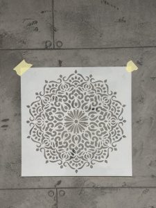 Preparing a mandala stencil with painter’s tape – most popular stencils in use