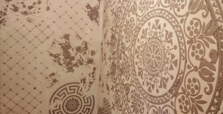 Modern bathroom renovation using stencil art and microcement finish