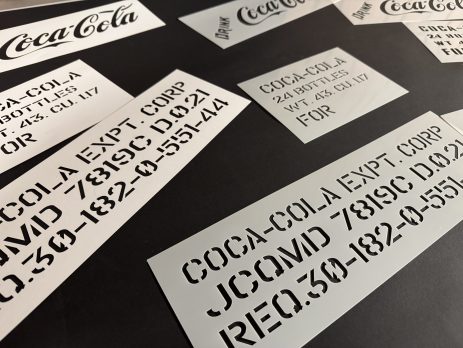 Industrial-style custom letter stencils with bold typography for labeling and decoration.