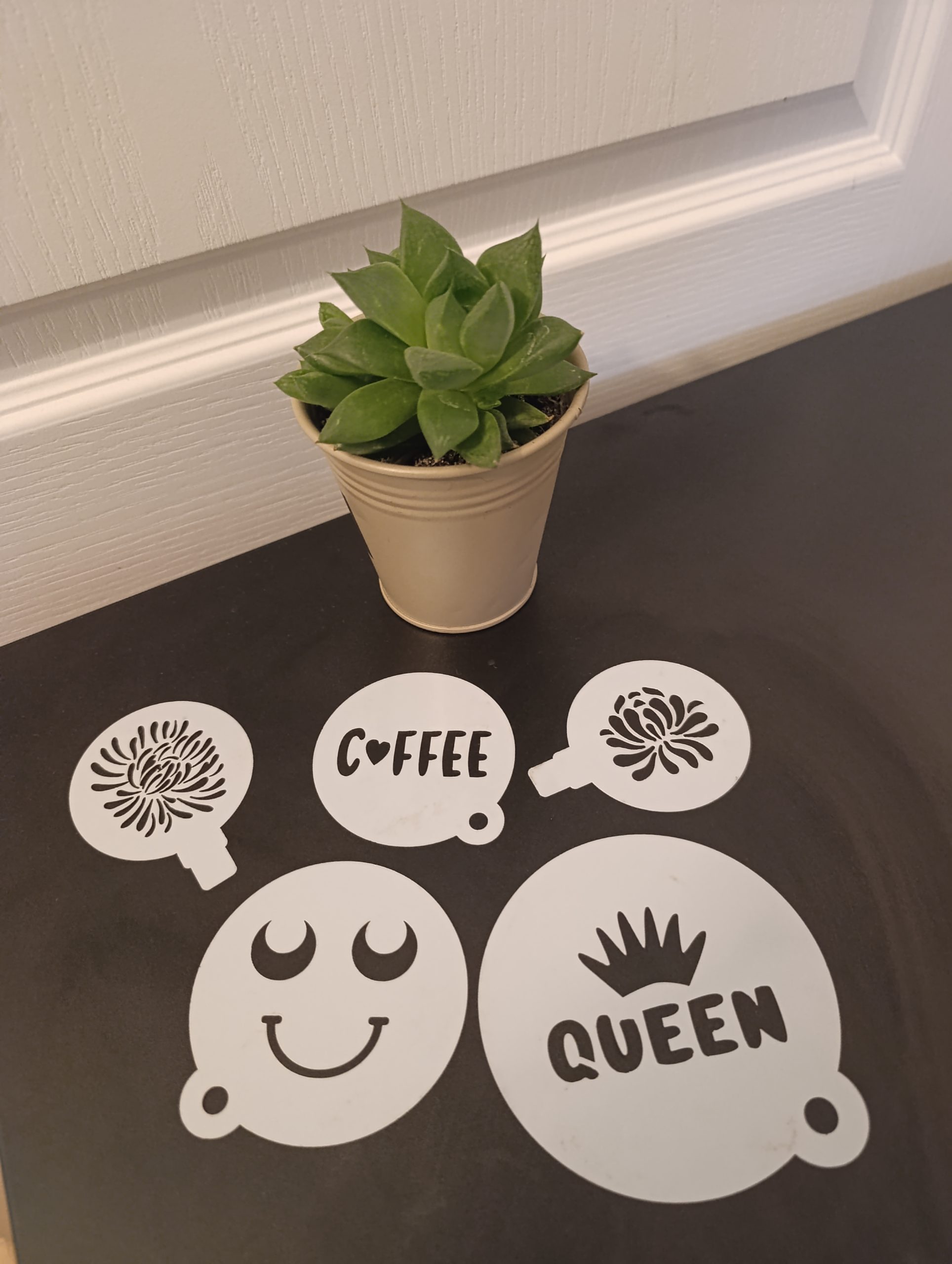 Mixed coffee stencils featuring smiley face, queen, coffee text, and floral designs